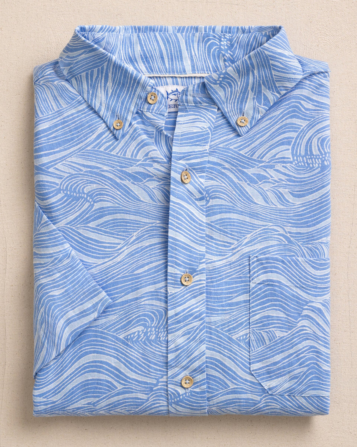 The front view of the Southern Tide Rolling Waves Linen Rayon Short Sleeve Sport Shirt by Southern Tide - Cerulean