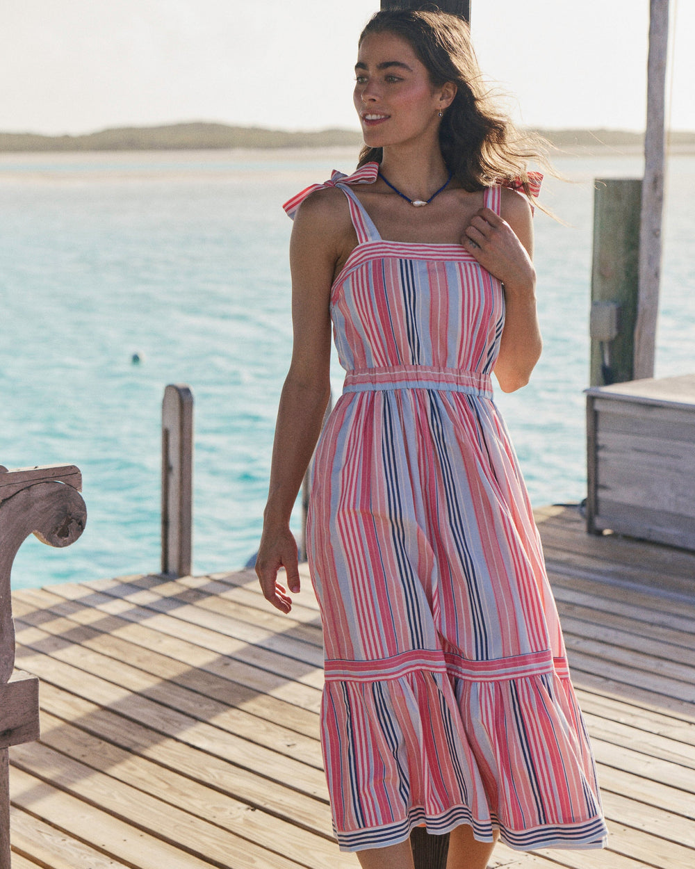 The lifestyle view of the Southern Tide Alexandrea Midi Dress by Southern Tide - Peaches N' Cream