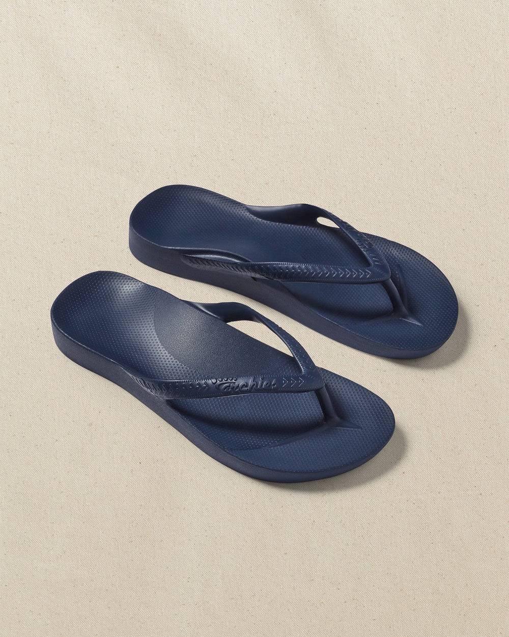 The front view of the Southern Tide Archie's Navy Arch Support Flip Flop by Southern Tide - Navy