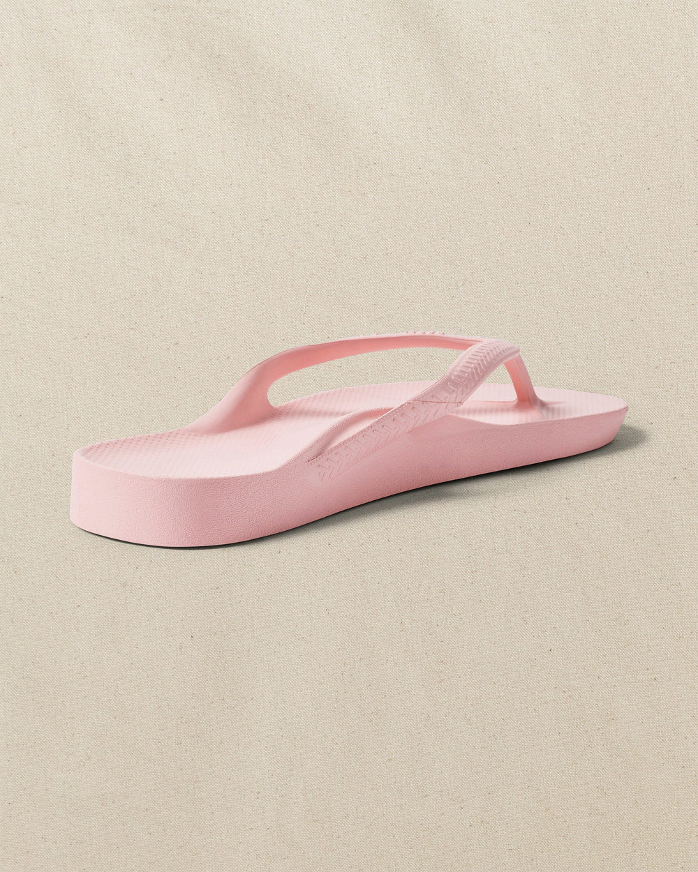 The right back view of the Southern Tide Archie's Soft Pink Arch Support Flip Flop by Southern Tide - Soft Pink