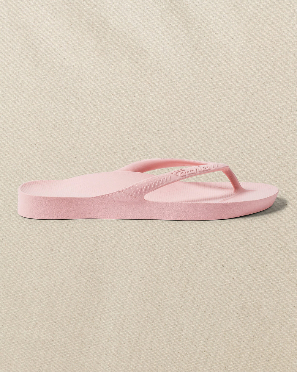 The right side view of the Southern Tide Archie's Soft Pink Arch Support Flip Flop by Southern Tide - Soft Pink
