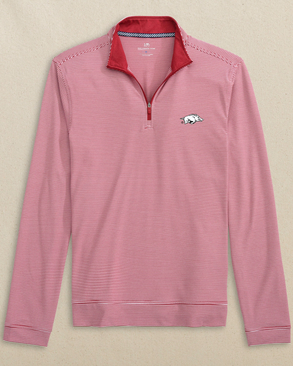 The front view of the Arkansas Razorbacks Cruiser Micro-Stripe Heather Quarter Zip by Southern Tide - Heather Crimson