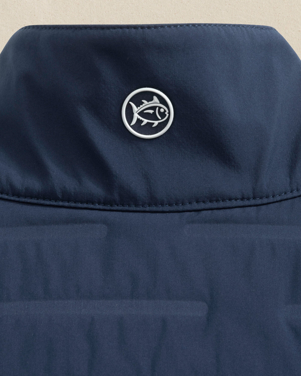 The detail view of the Southern Tide Auburn Tigers Coligny Quilted Vest by Southern Tide - Dress Blue