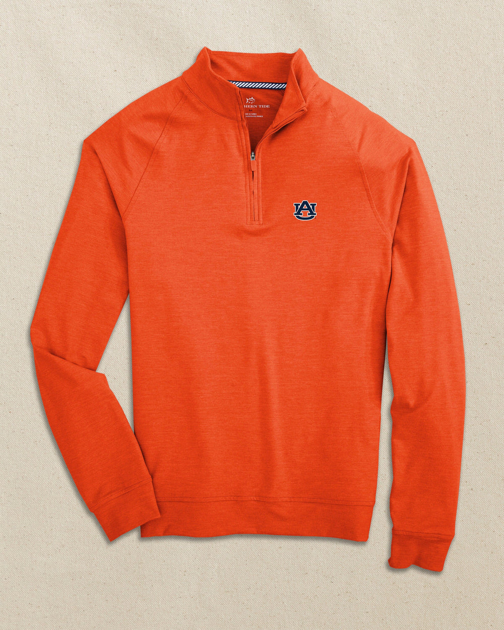The front view of the Auburn Tigers Cruiser Heather Quarter Zip Pullover by Southern Tide - Heather Endzone Orange