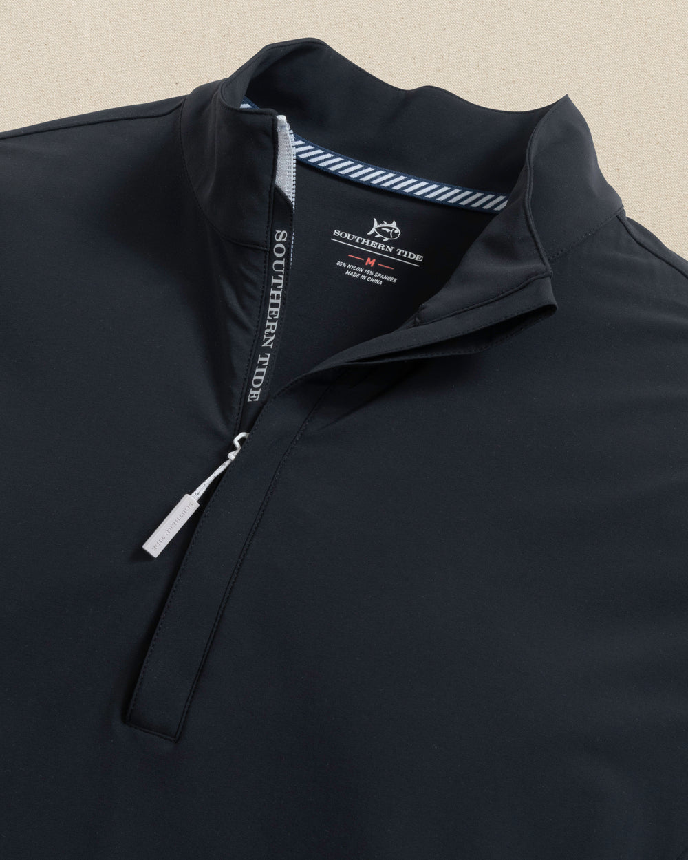 The front detail view of the Southern Tide Avondale Performance Jacket by Southern Tide - Caviar Black