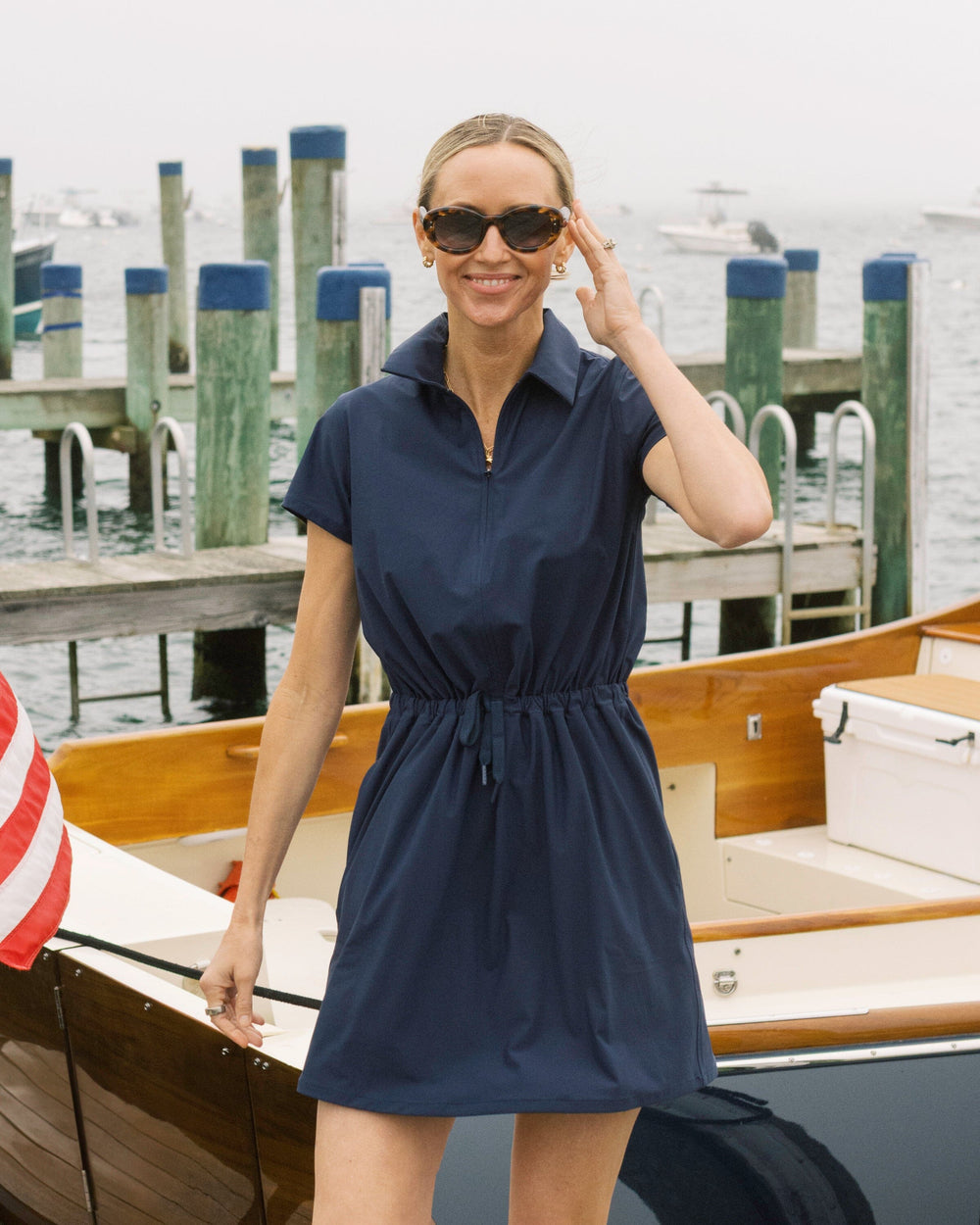The lifestyle view of the Southern Tide Bailee Short Sleeve Performance Dress by Southern Tide - Dress Blue