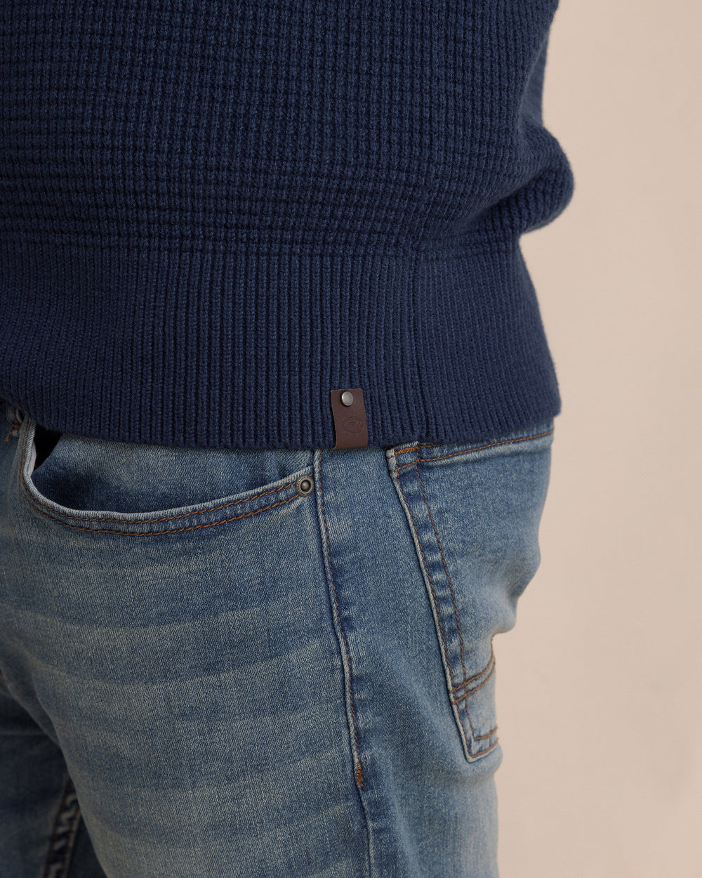 The detail view of the Southern Tide Bass Creek Heather Quarter Button Sweater by Southern Tide - Heather Dress Blue