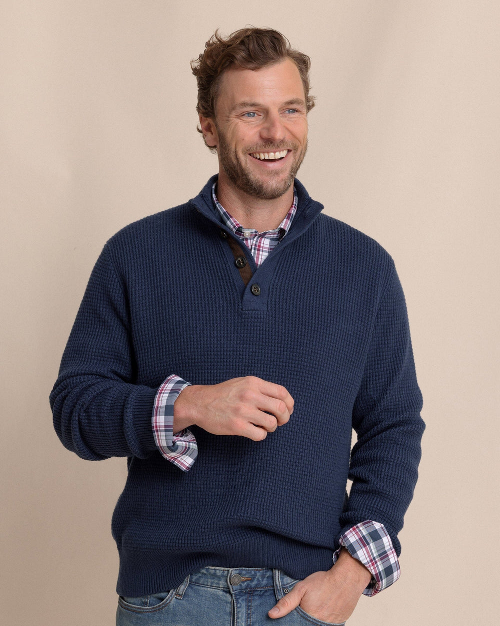 The front view of the Southern Tide Bass Creek Heather Quarter Button Sweater by Southern Tide - Heather Dress Blue