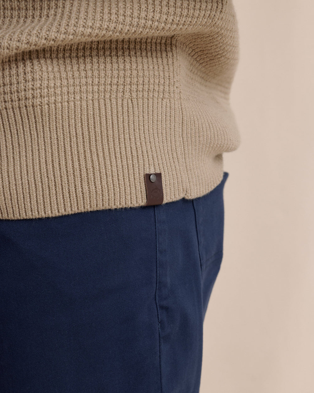 The detail view of the Southern Tide Bass Creek Heather Quarter Button Sweater by Southern Tide - Heather Sandstone Khaki