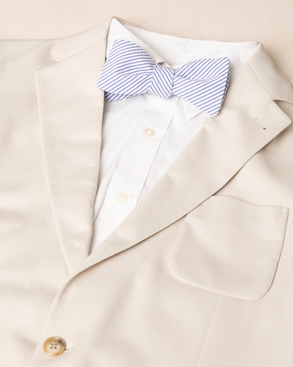 The detail coat view of the Southern Tide Blue and White Seersucker Bow Tie by Southern Tide - Blue