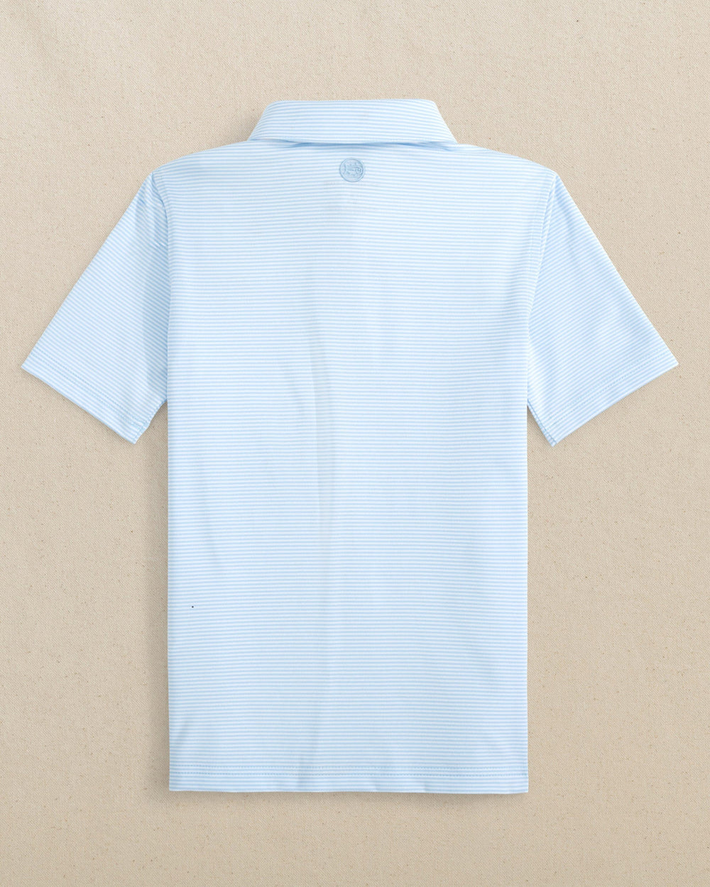 The back view of the Southern Tide Boys Driver Meadowbrook Stripe Performance Polo by Southern Tide - Clearwater Blue