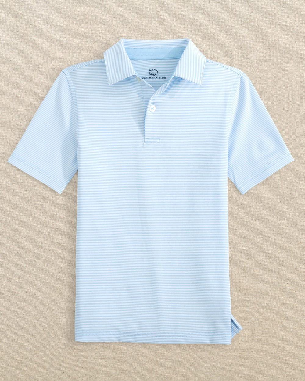 The front view of the Southern Tide Boys Driver Meadowbrook Stripe Performance Polo by Southern Tide - Clearwater Blue