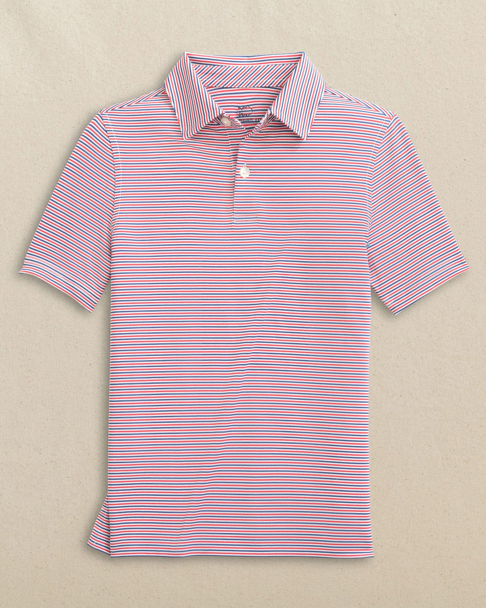 The front view of the Southern Tide Boys Driver Micro-Stripe Performance Polo by Southern Tide - Channel Marker Red