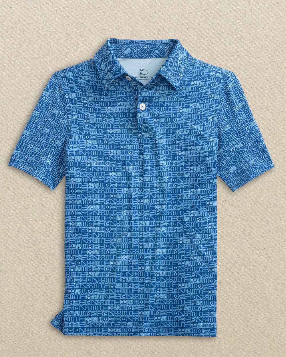 The front view of the Southern Tide Boys Driver Nautical Flags Printed Performance Polo by Southern Tide - Nautical Blue