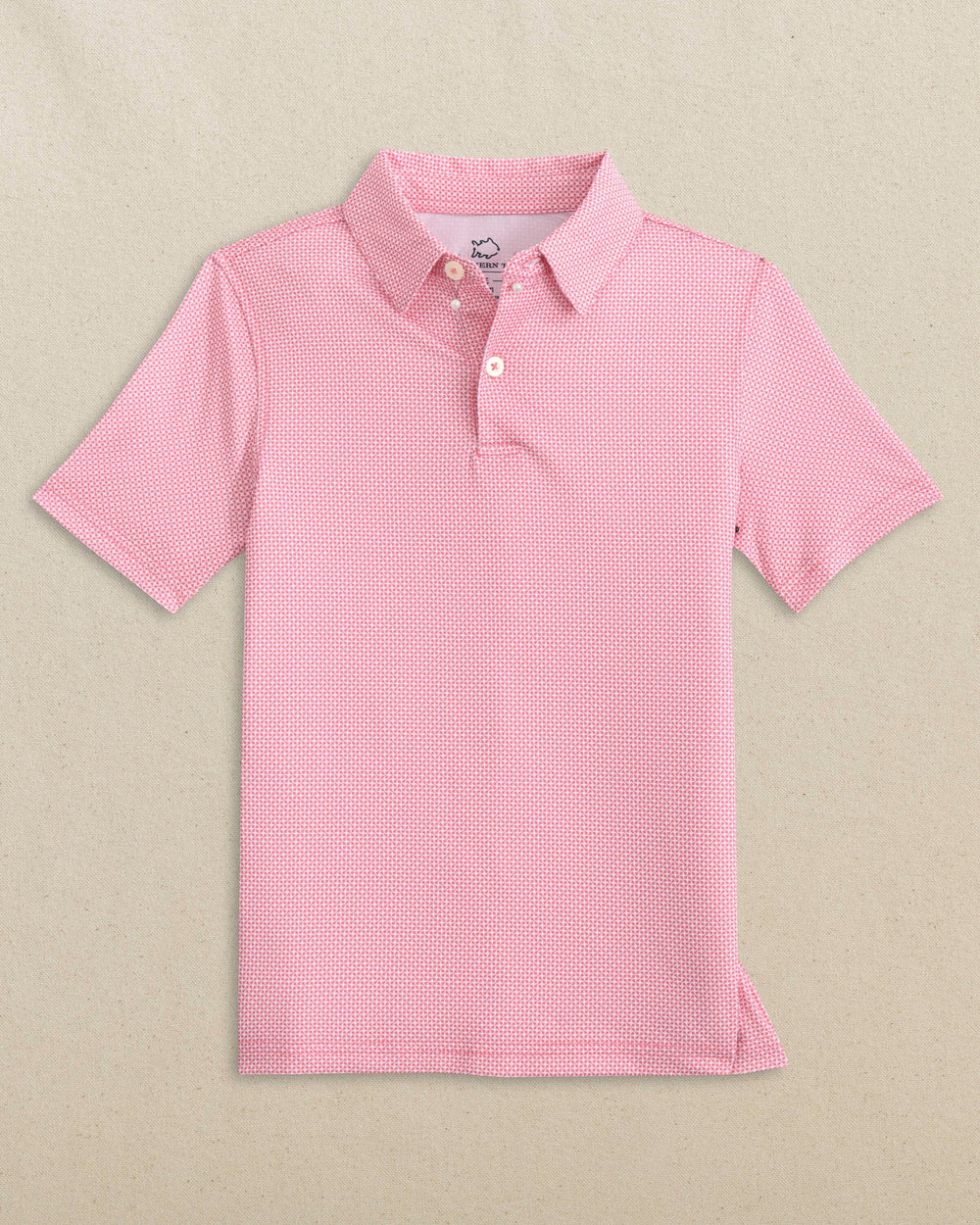 The front view of the Southern Tide Boys Driver Ocean Vista Printed Performance Polo by Southern Tide - Island Pink