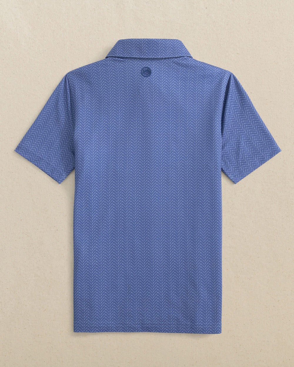 The back view of the Southern Tide Boys Driver Raise The Par Printed Performance Polo by Southern Tide - Nautical Blue