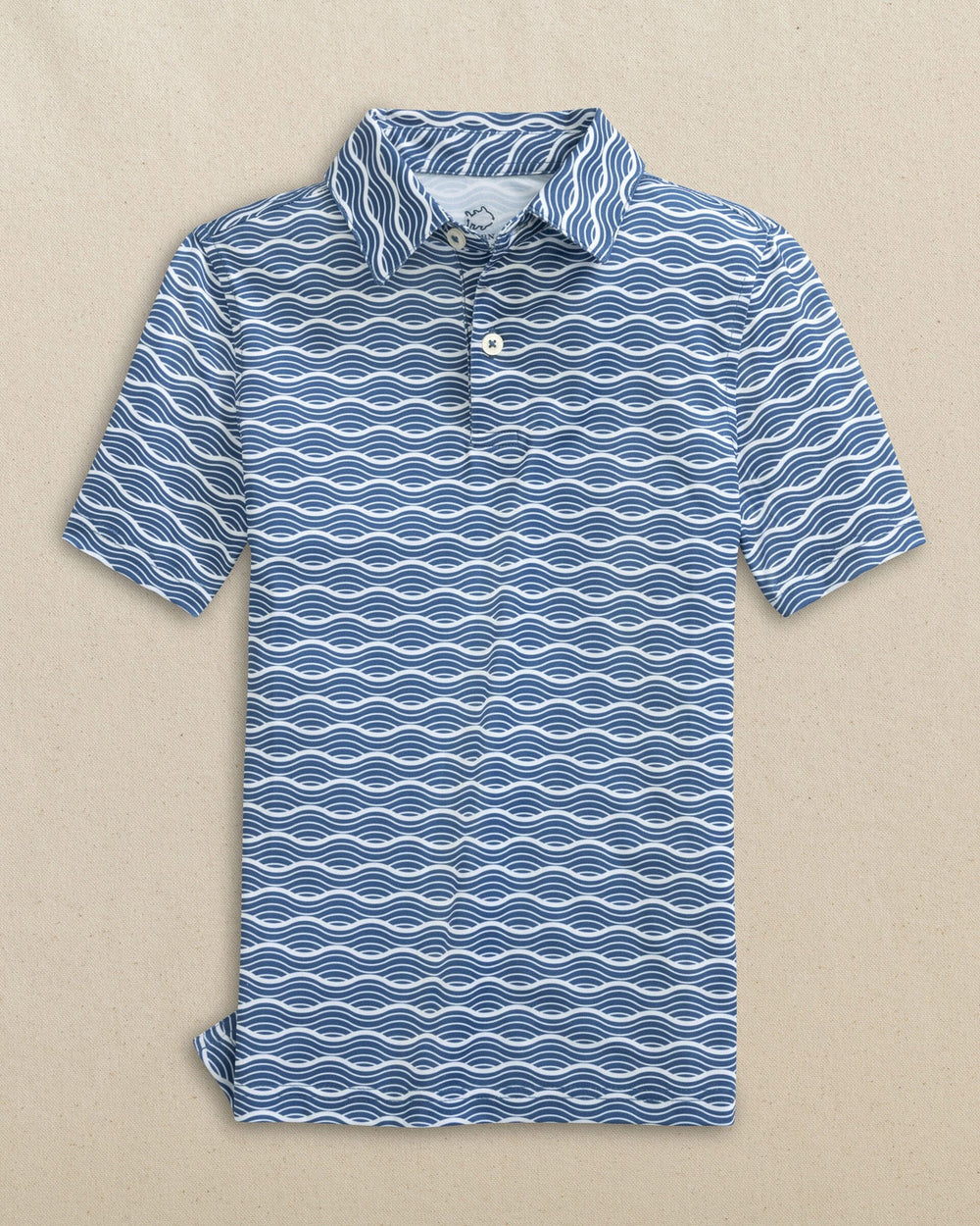 The front view of the Southern Tide Boys Driver Waves Printed Performance Polo by Southern Tide - Nautical Blue