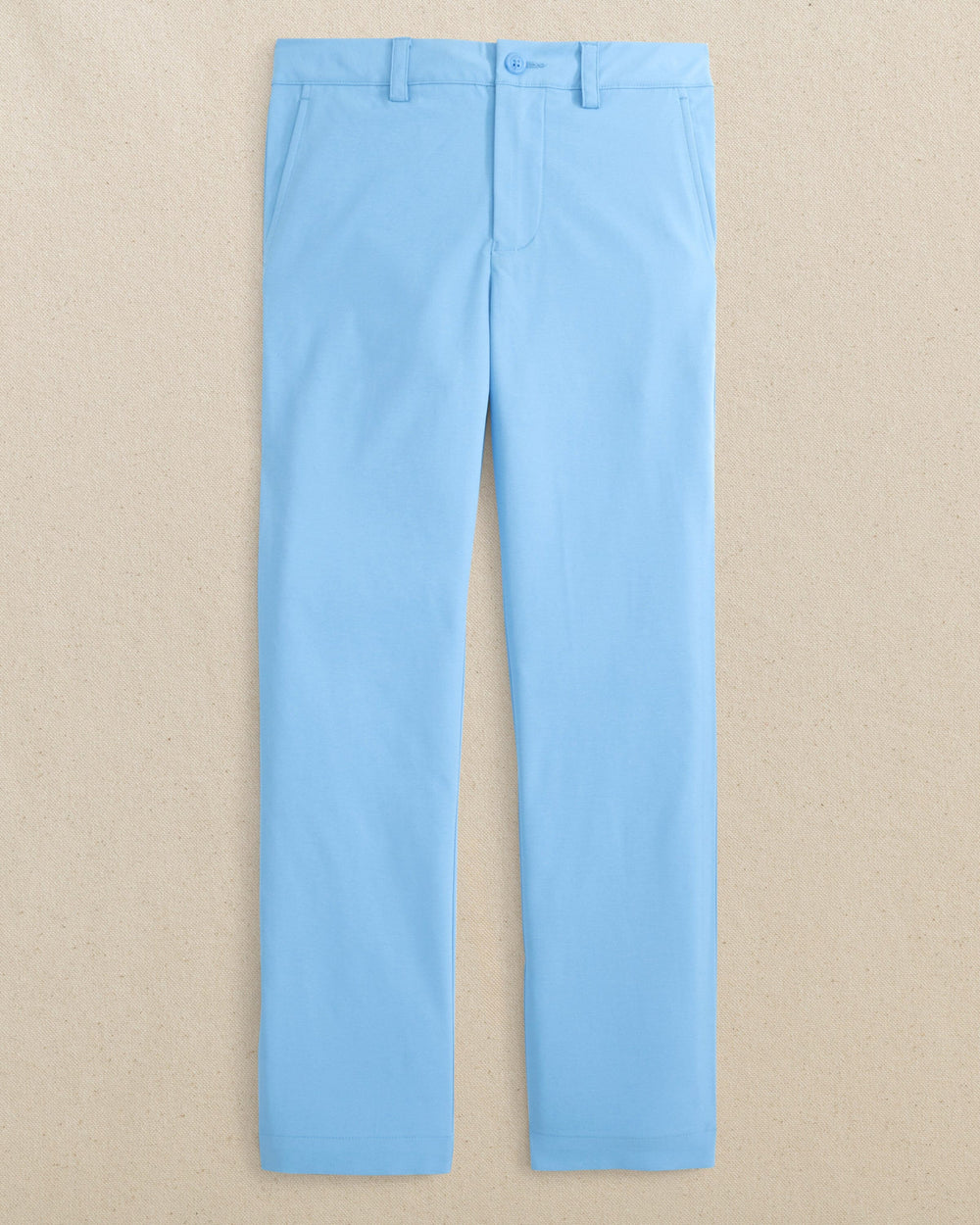 The front view of the Boys Leadhead Performance Pant by Southern Tide - Ocean Channel