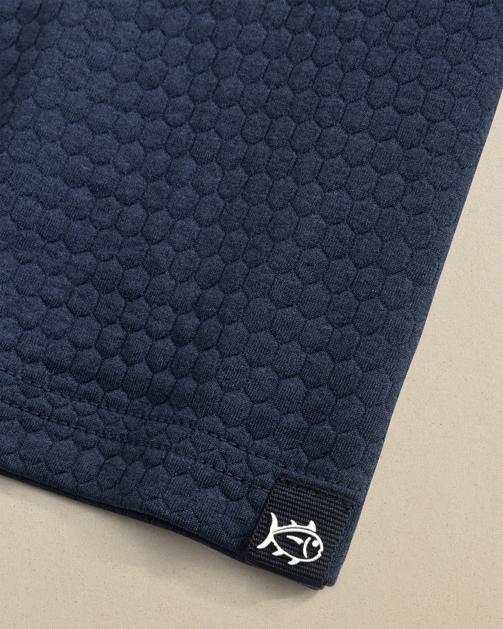 The detail view of the Southern Tide Boys Scuttle Hoodie by Southern Tide - Heather True Navy