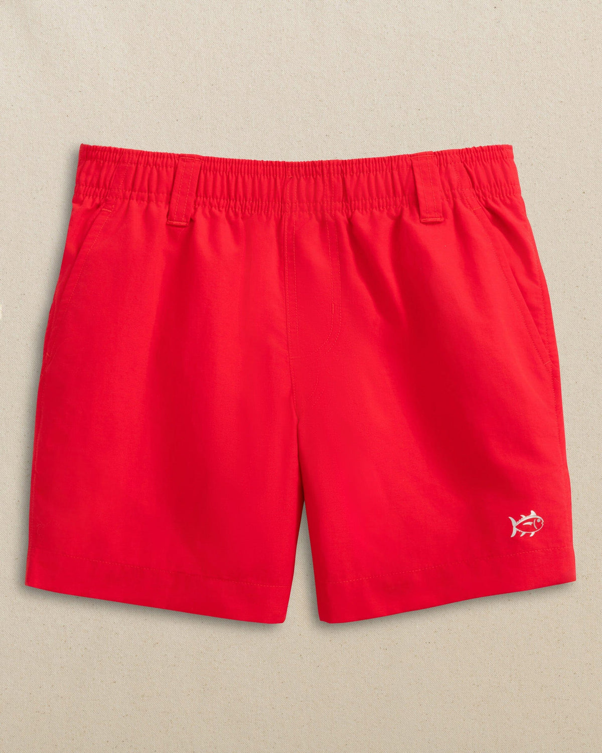 The front view of the Southern Tide Boys Shoreline Active Short by Southern Tide - Channel Marker Red