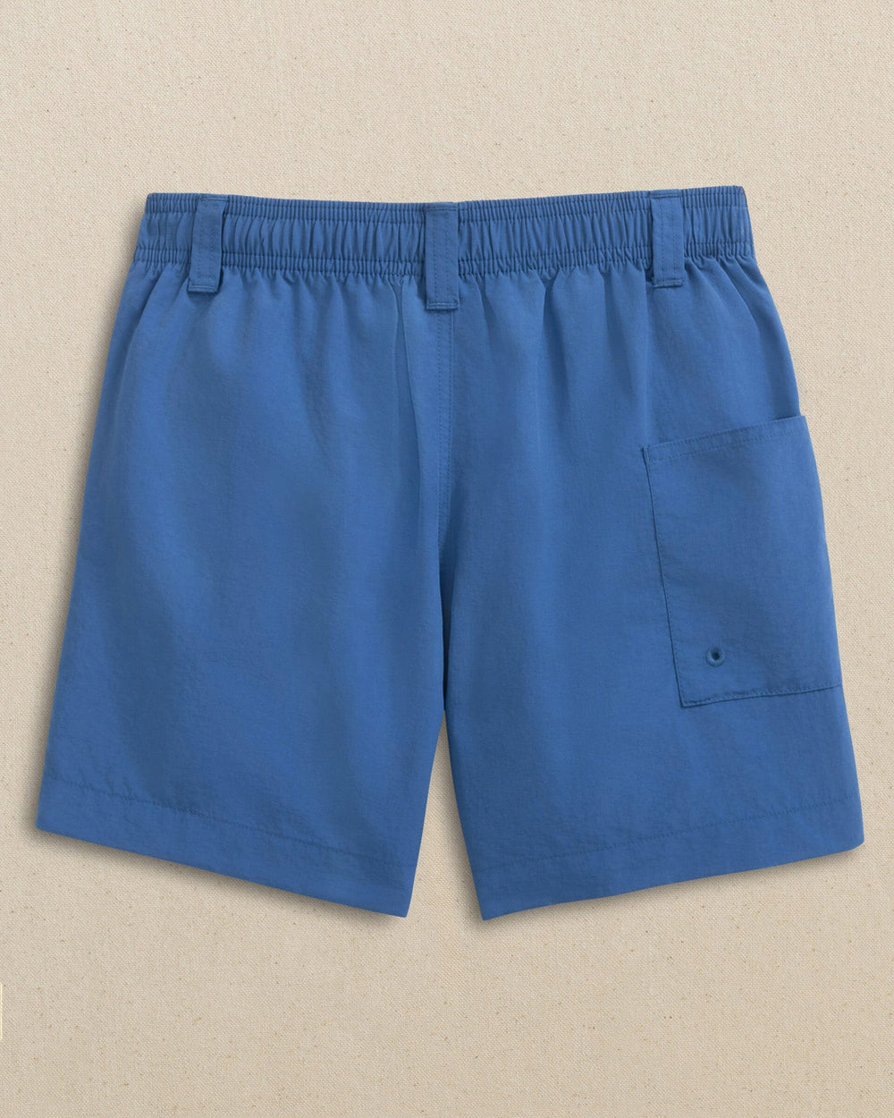 The back view of the Southern Tide Boys Shoreline Active Short by Southern Tide - Nautical Blue