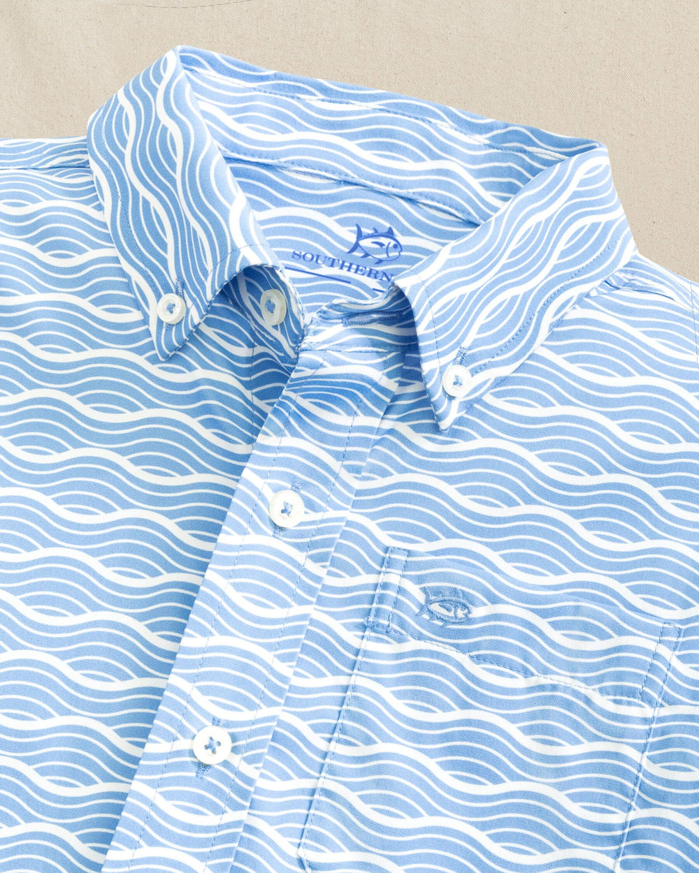 The detail view of the Southern Tide Boys Waves Coastal Breeze® Short Sleeve Sport Shirt by Southern Tide - Ocean Channel