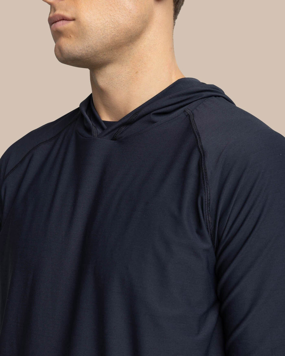 The detail view of the Southern Tide brrr-illiant Performance Hoodie by Southern Tide - Caviar Black
