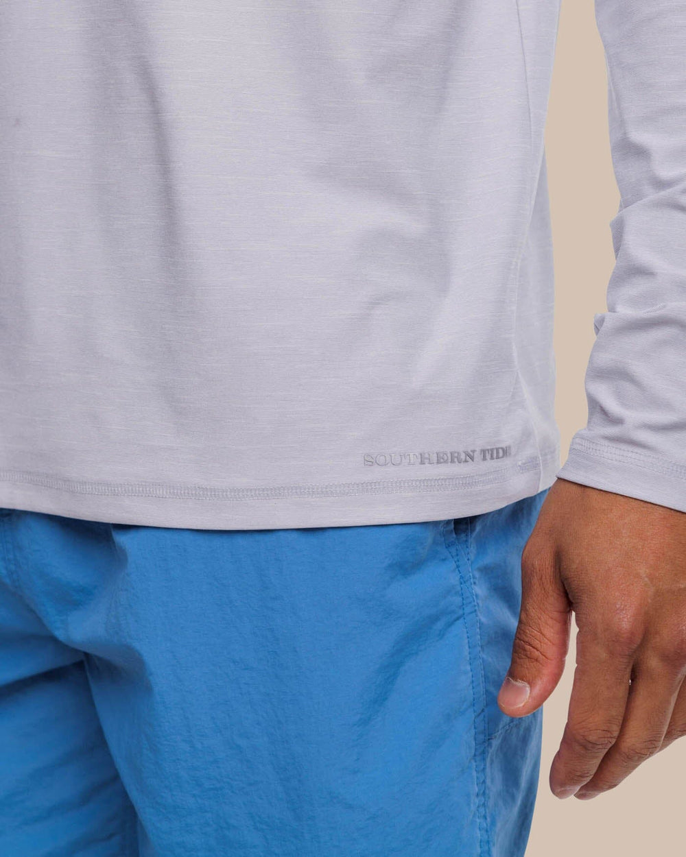 The label view of the Southern Tide brrr-illiant Performance Long Sleeve Tee by Southern Tide - Platinum Grey