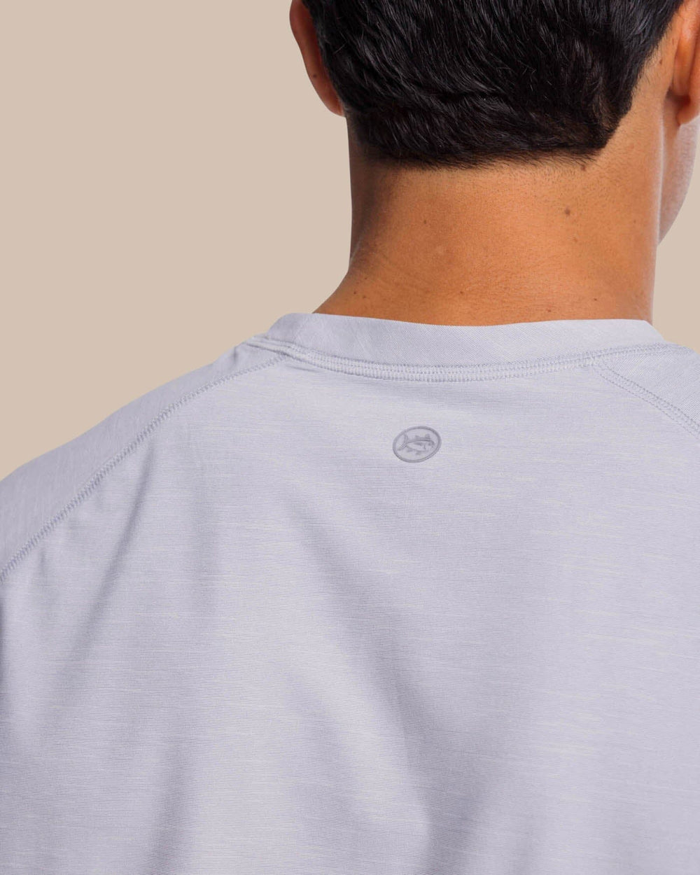 The yoke view of the Southern Tide brrr-illiant Performance Long Sleeve Tee by Southern Tide - Platinum Grey