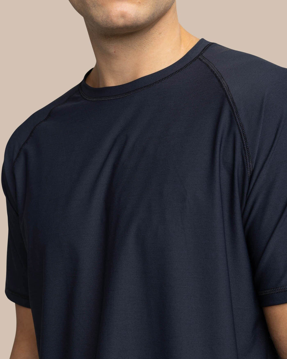 The detail view of the Southern Tide brrr-illiant Performance T-Shirt by Southern Tide - Caviar Black