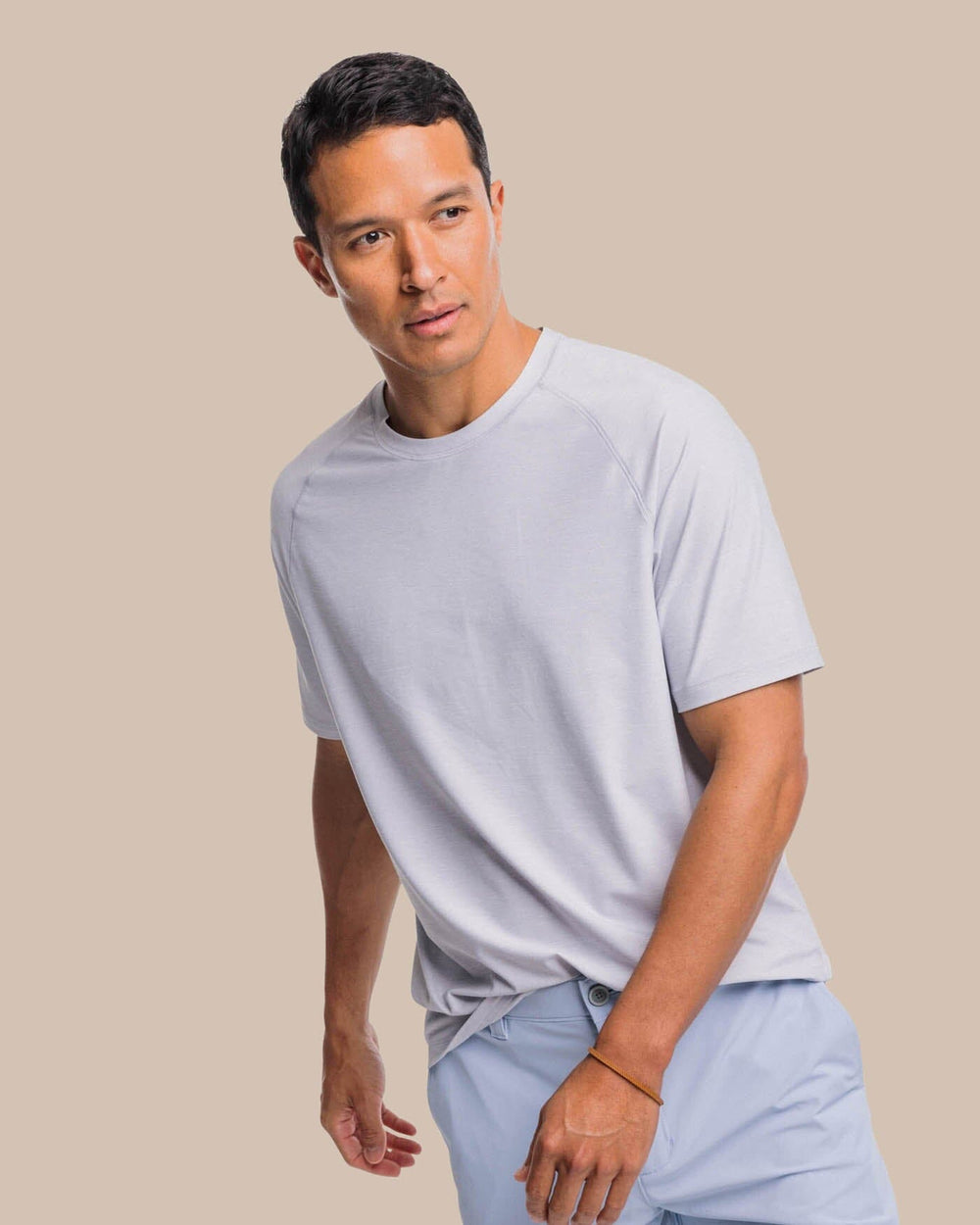 The front view of the Southern Tide brrr°®-illiant Performance Tee by Southern Tide - Platinum Grey