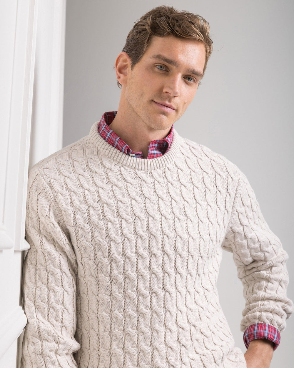 The front view of the Southern Tide Cable Knit Crew Sweater by Southern Tide - Star White