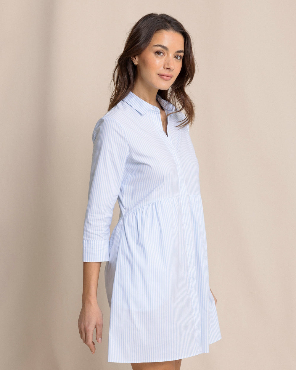 The side view of the Southern Tide Cara brrr°® Stripe Dress by Southern Tide - Cerulean