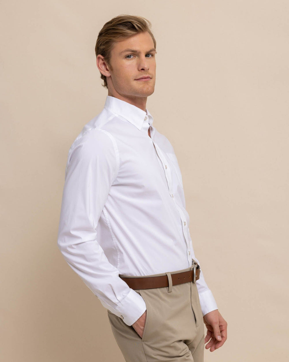 The front view of the Southern Tide Charleston Overbrook Solid Embroidered Sport Shirt by Southern Tide - Classic White
