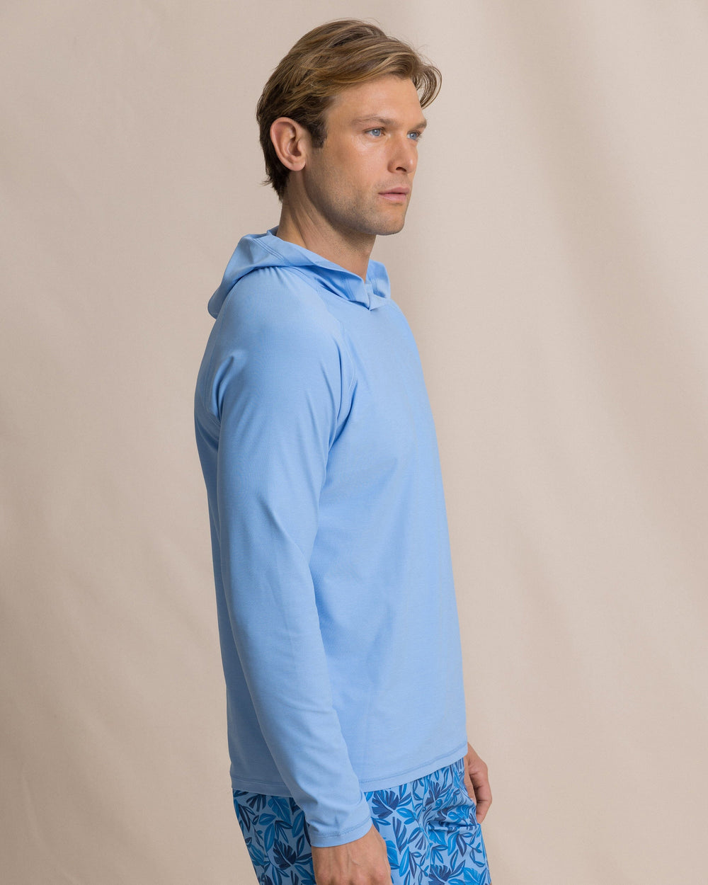 The side view of the Southern Tide Coastal Breeze® Performance Hoodie by Southern Tide - Ocean Channel