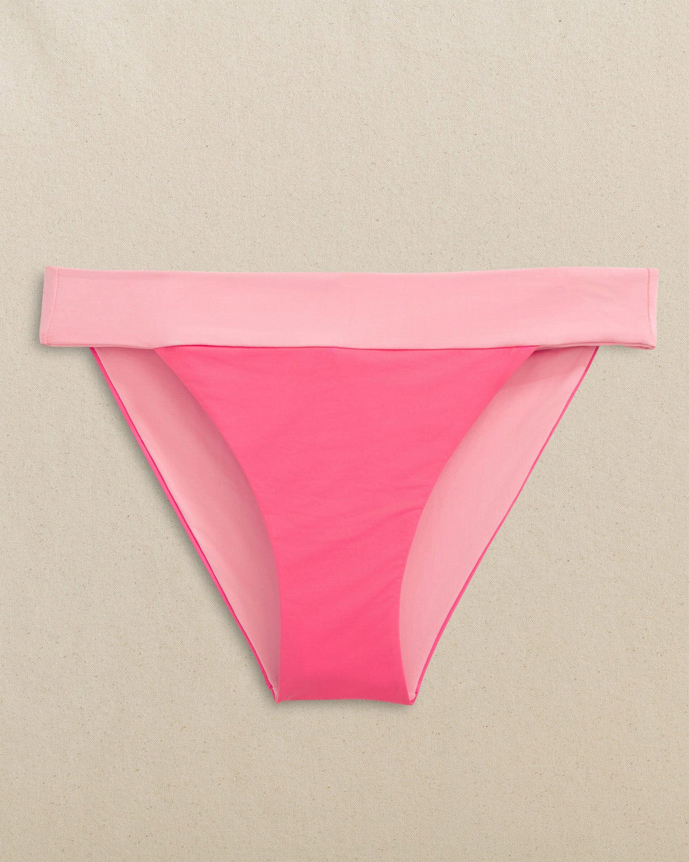 The front view of the Southern Tide Colorblock Bikini Bottom by Southern Tide - Island Pink