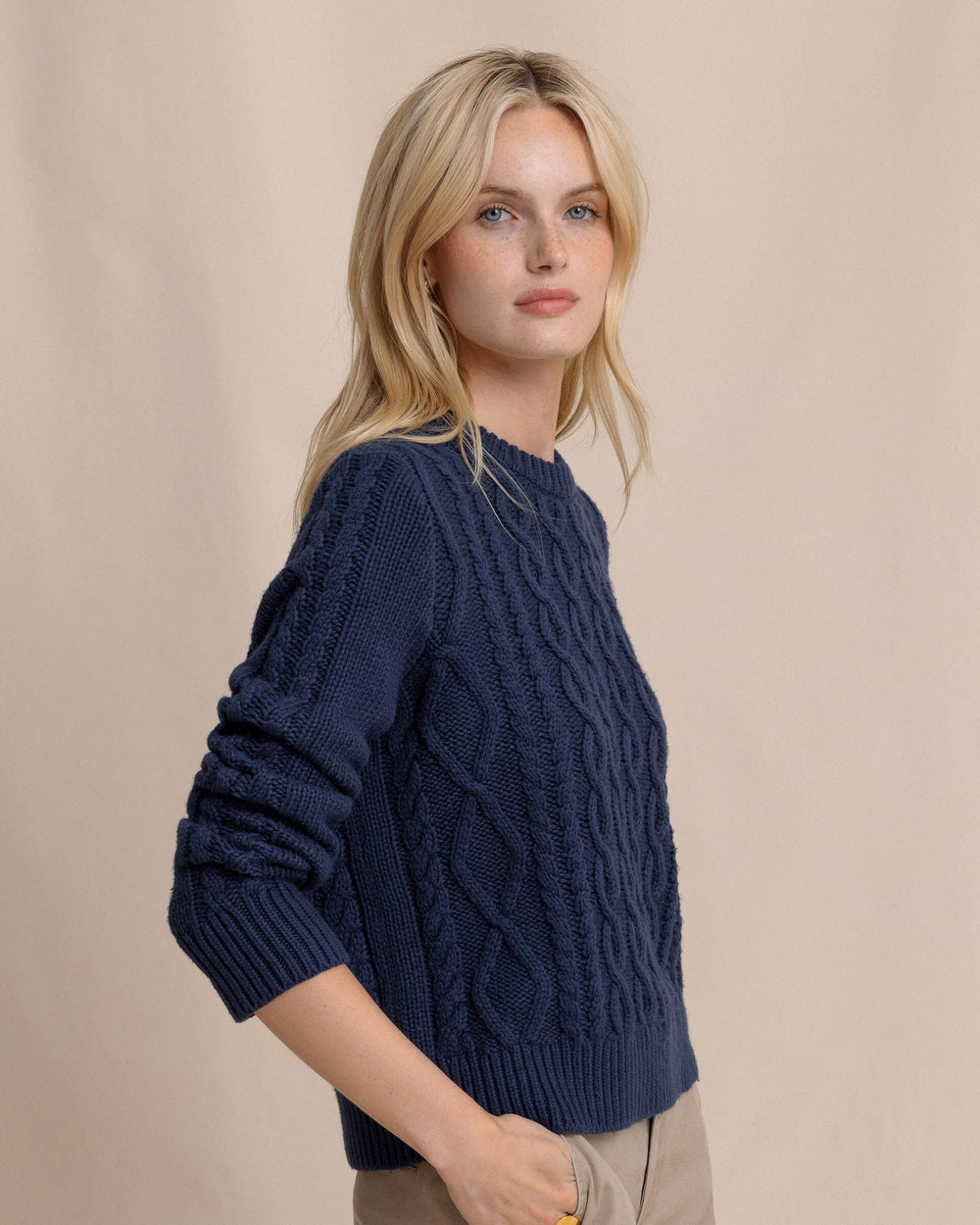 The side view of the Southern Tide Connie Cable Knit Sweater by Southern Tide - Dress Blue