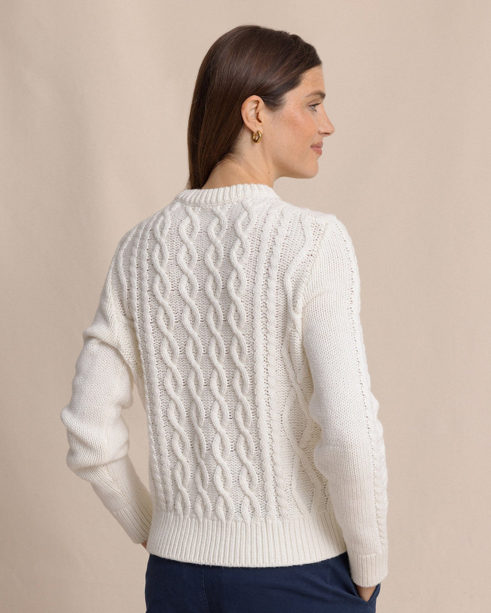 The back view of the Southern Tide Connie Cable Knit Sweater by Southern Tide - Sand White