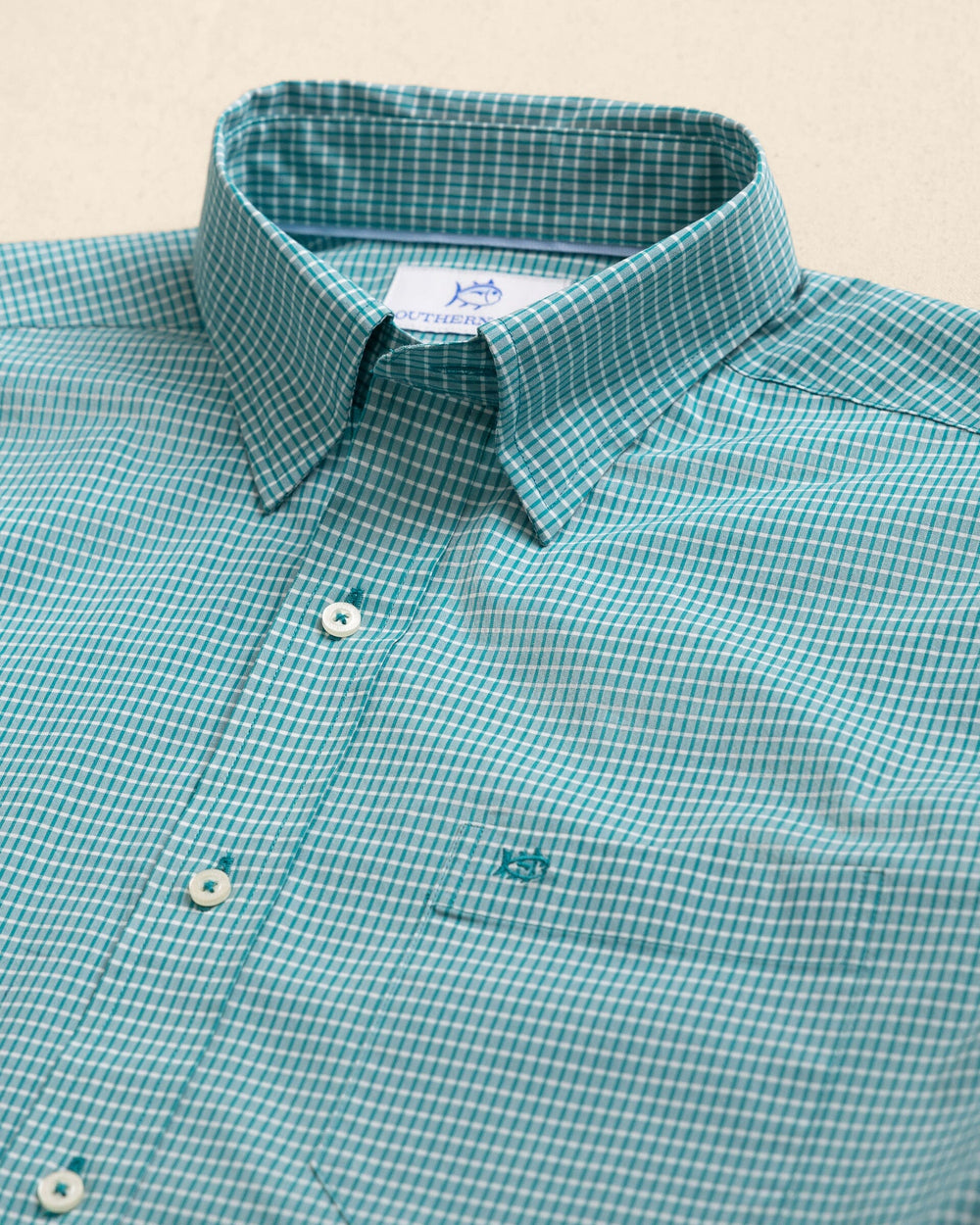 The detail view of the Southern Tide Crofton Plaid Charleston Sport Shirt by Southern Tide - Spruce Shade