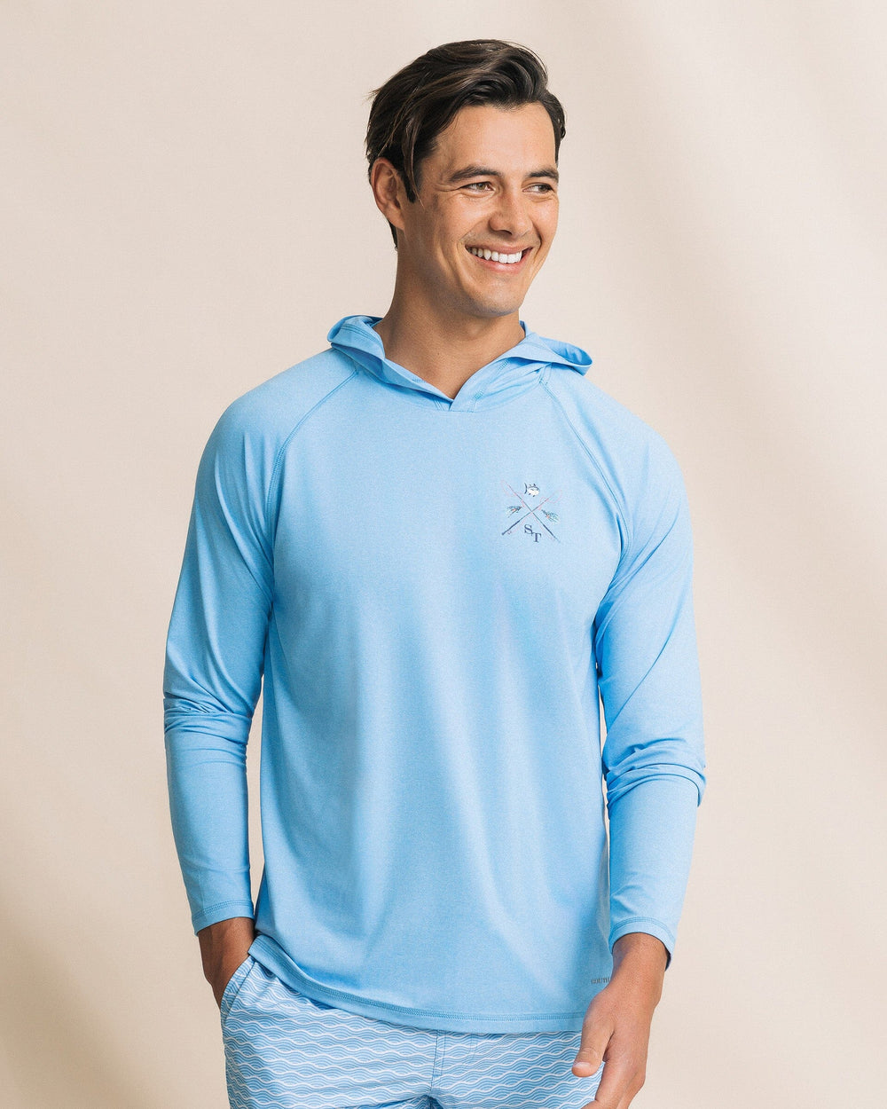 The front view of the Southern Tide Crossed Lines Coastal Breeze® Performance Hoodie by Southern Tide - Ocean Channel