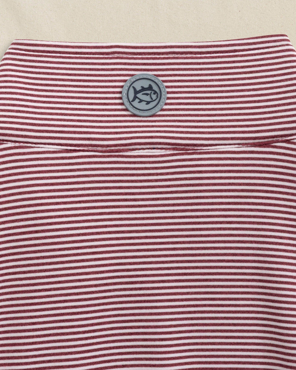 The detail view of the Southern Tide Cruiser Micro-Stripe Heather Quarter Zip by Southern Tide - Heather Chianti