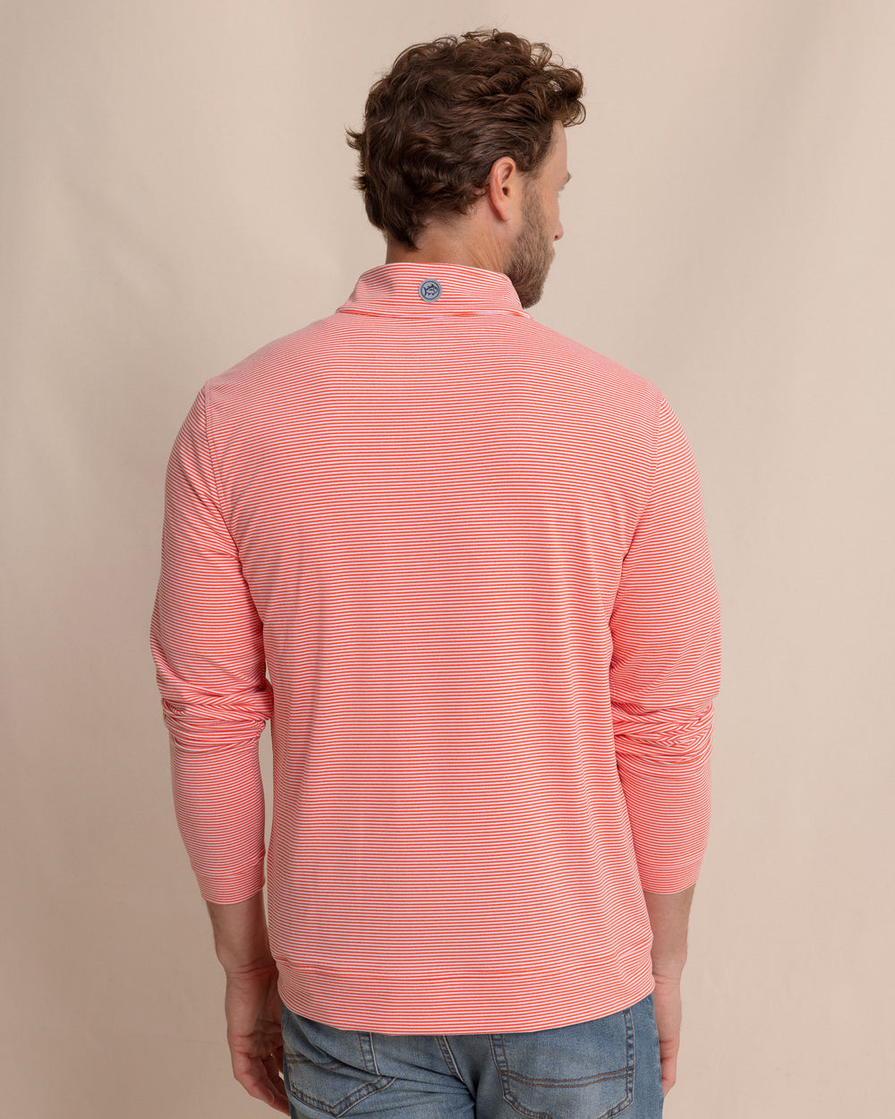 The back view of the Southern Tide Cruiser Micro-Stripe Heather Quarter Zip by Southern Tide - Heather Endzone Orange