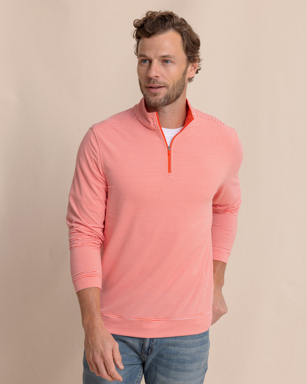 The front view of the Southern Tide Cruiser Micro-Stripe Heather Quarter Zip by Southern Tide - Heather Endzone Orange