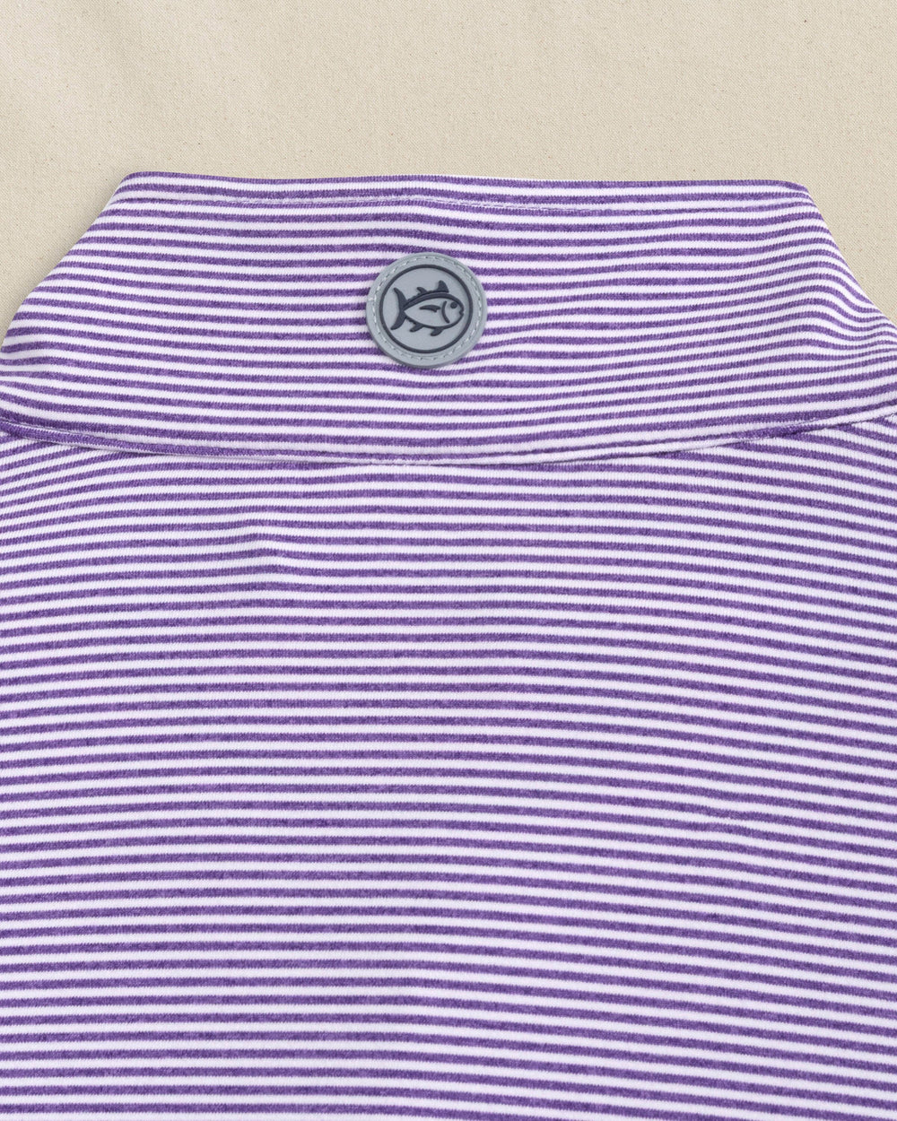 The detail view of the Southern Tide Cruiser Micro-Stripe Heather Quarter Zip by Southern Tide - Heather Regal Purple