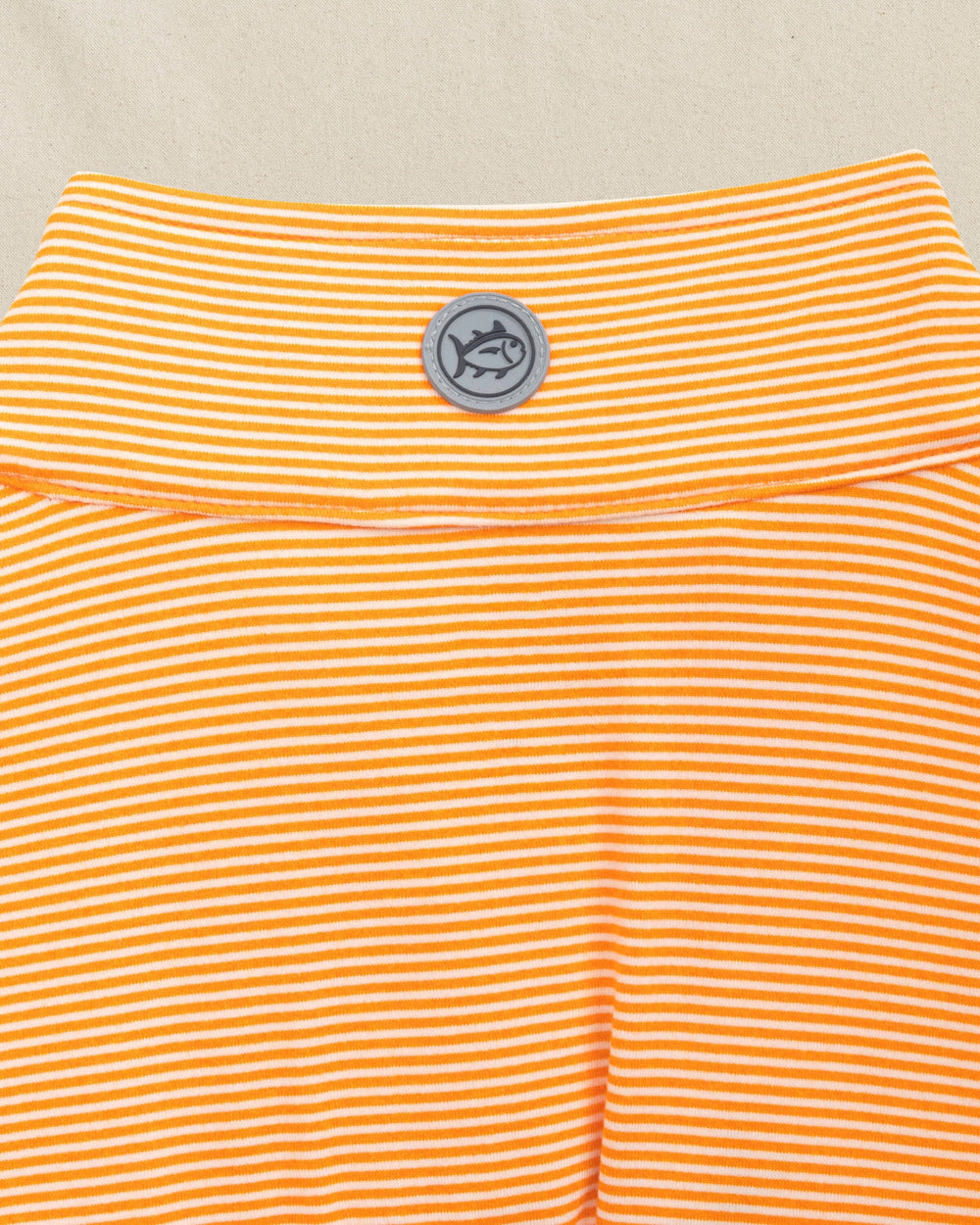 The detail view of the Southern Tide Cruiser Micro-Stripe Heather Quarter Zip by Southern Tide - Heather Rocky Top Orange