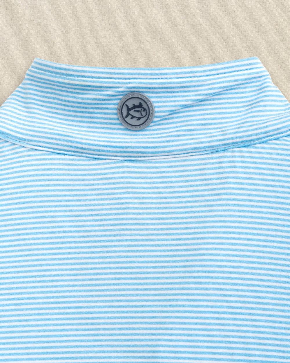 The detail view of the Southern Tide Cruiser Micro-Stripe Heather Quarter Zip by Southern Tide - Heather Rush Blue
