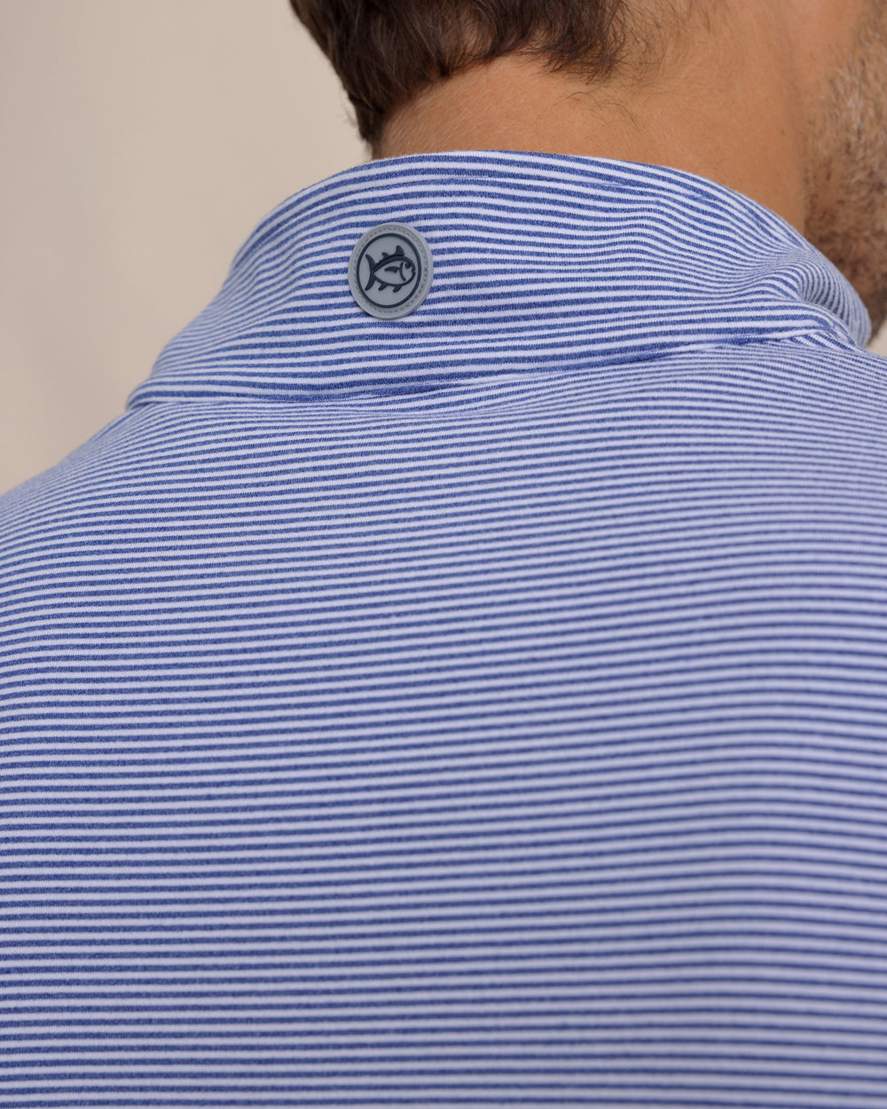 The detail view of the Southern Tide Cruiser Micro-Stripe Heather Quarter Zip by Southern Tide - Heather University Blue
