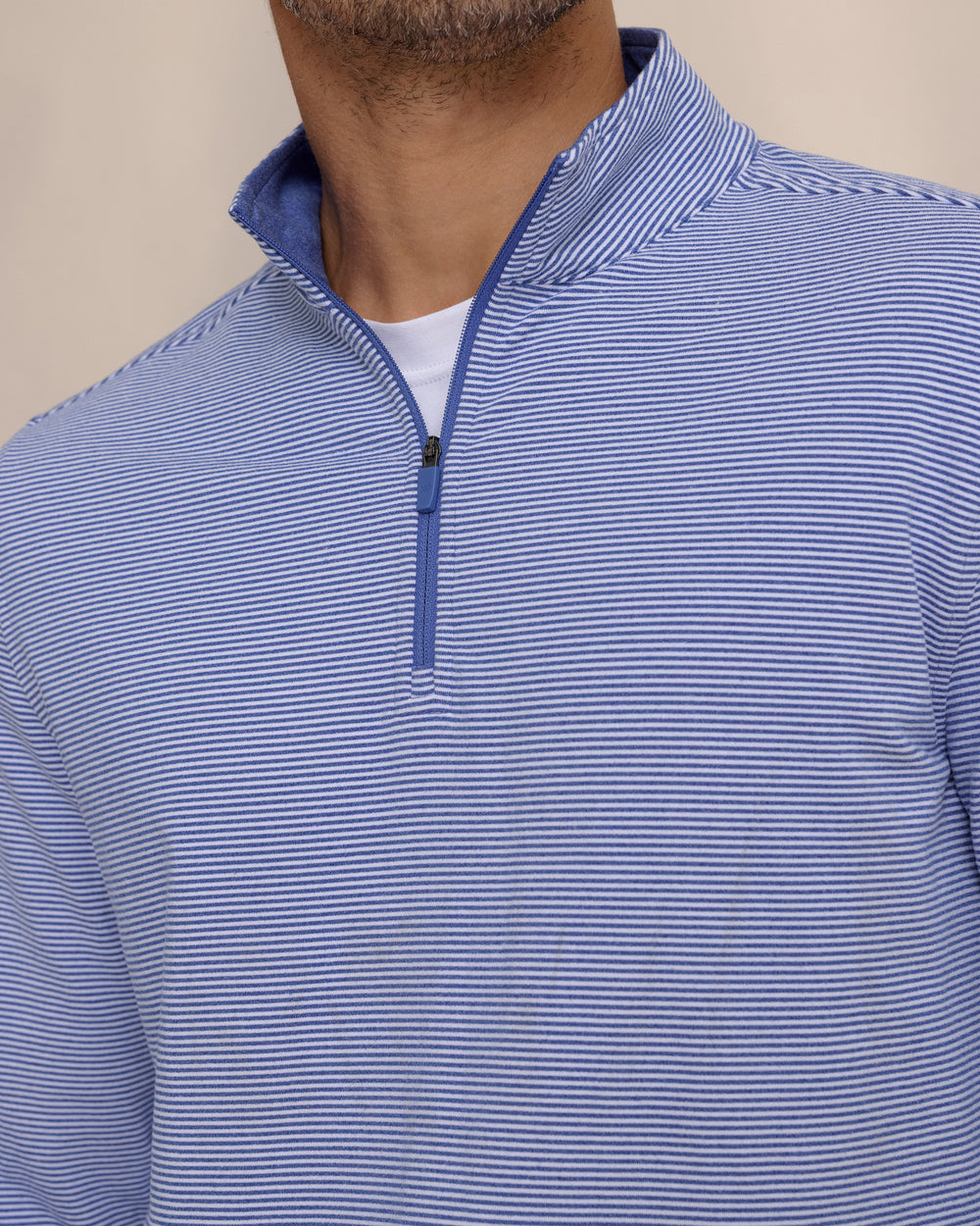 The detail view of the Southern Tide Cruiser Micro-Stripe Heather Quarter Zip by Southern Tide - Heather University Blue