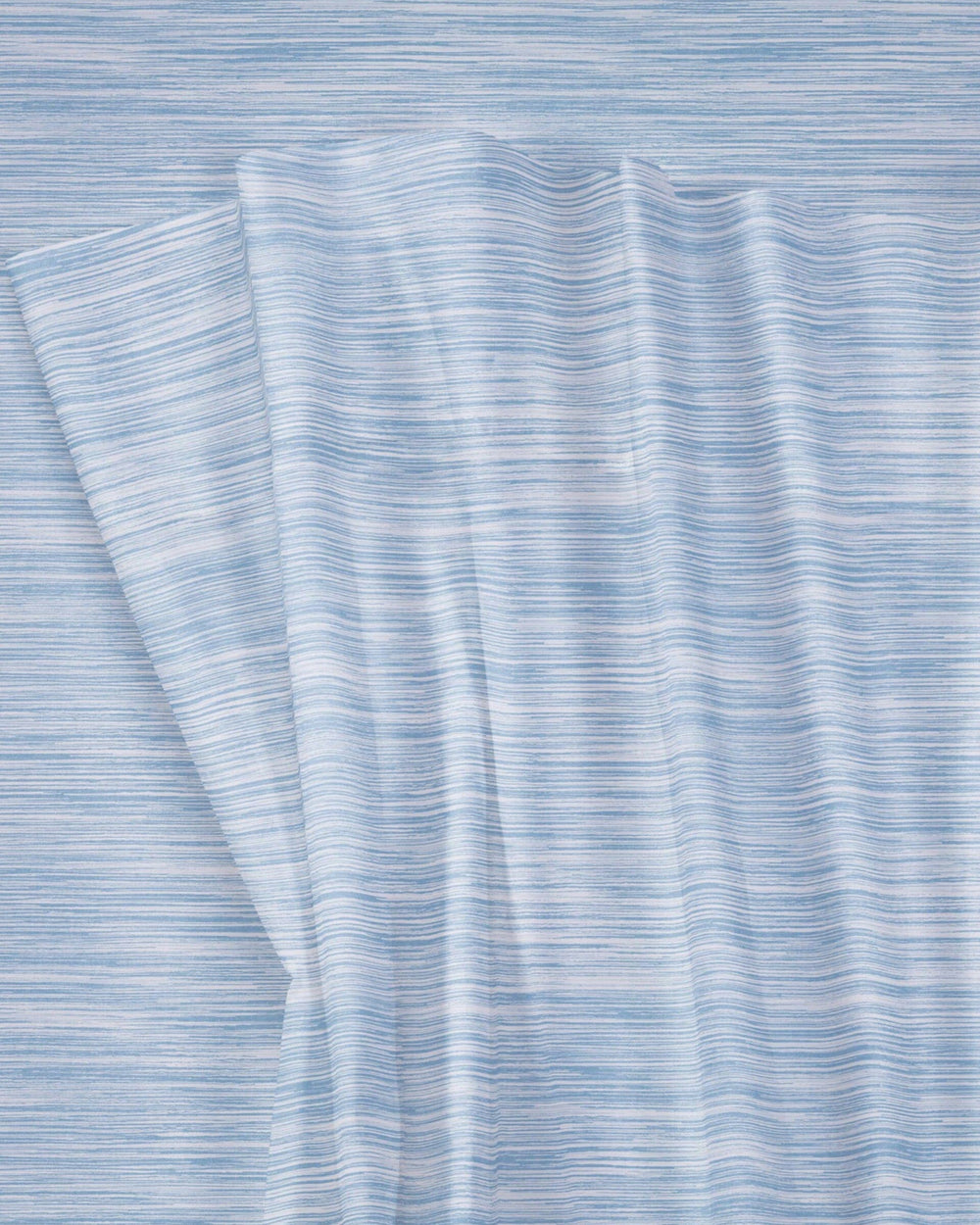 The detail view of the Southern Tide Distressed Stripe Sheet Set by Southern Tide - Blue