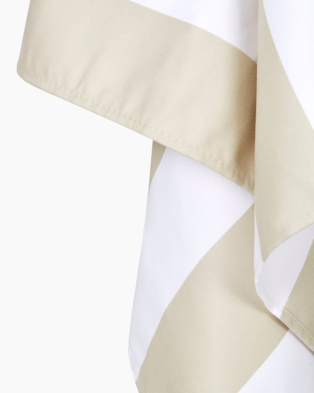 The detail view of the Southern Tide Dock & Bay Quick Dry Beach Towel by Southern Tide - Bora Bora Beige